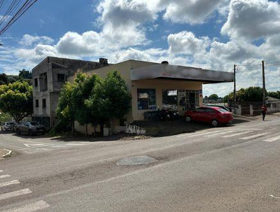 Sala comercial, Porões e apartamento semiacabados em um amplo terreno de 600 m², ideal pará investimento ou expansão comercial.